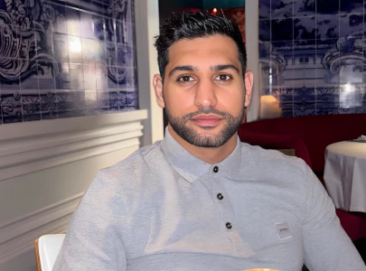 amir khan slams genocide enablers after gaza fundraiser cancellation in london